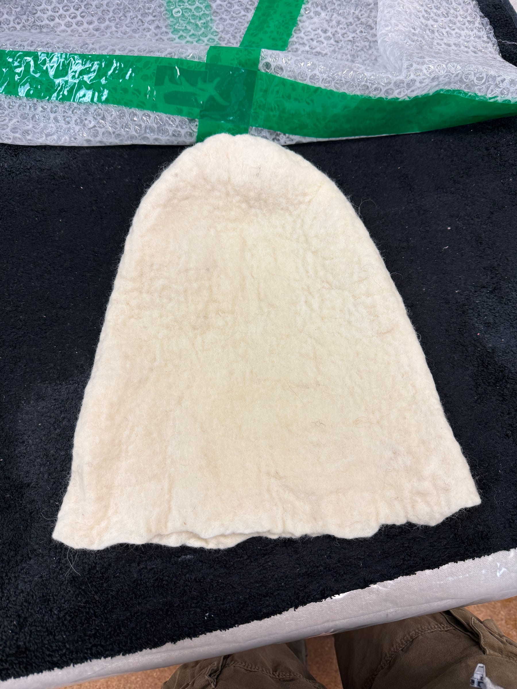 The seamless white felt shell after forming