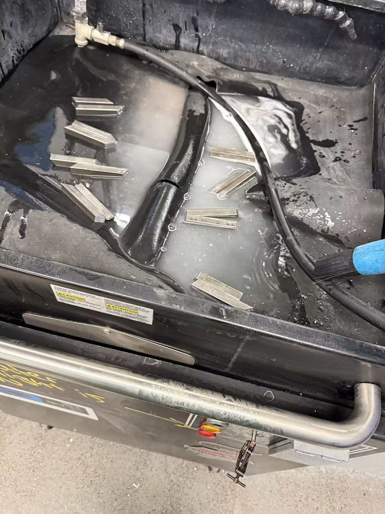 Cleaning and preparing cut steel pieces