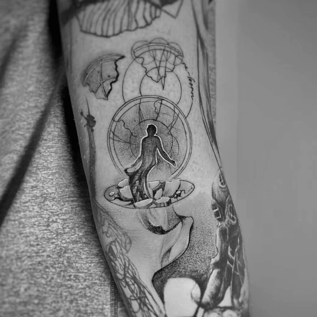 Meditating figure inside a fractured circular tattoo composition